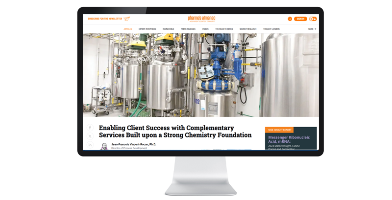 A computer monitor displays an article about chemistry services, featuring industrial machinery with stainless steel equipment, published by Pharma's Almanac.